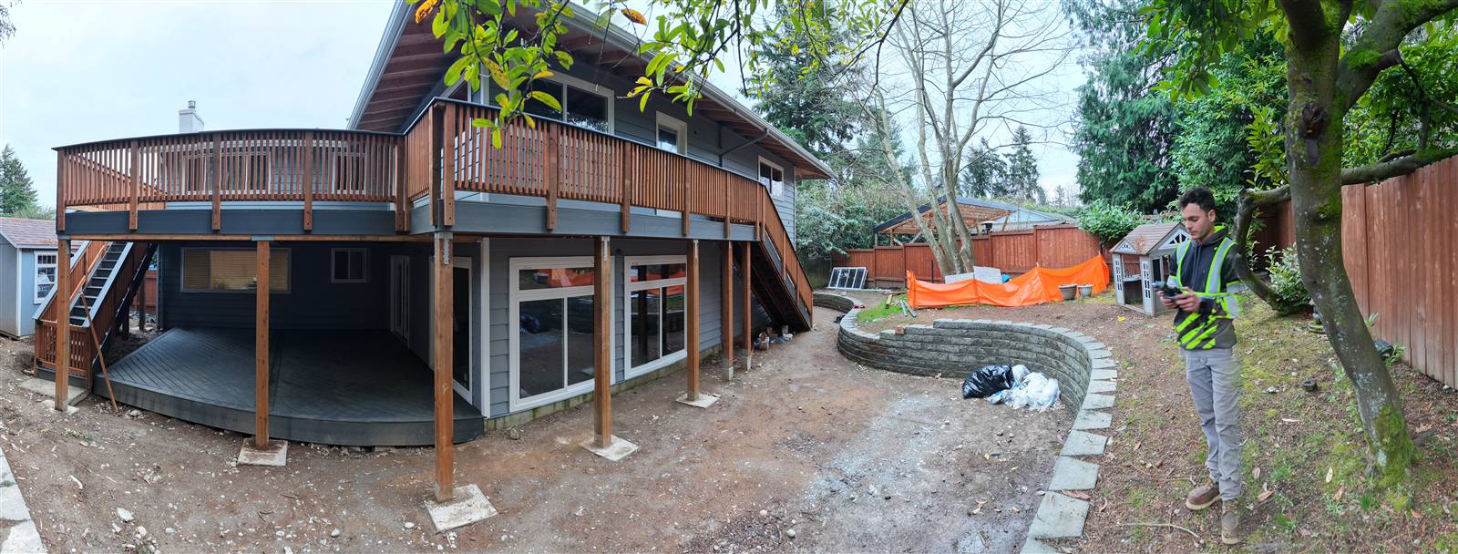 Wraparound deck and lower-level framing on a completed Seattle addition project